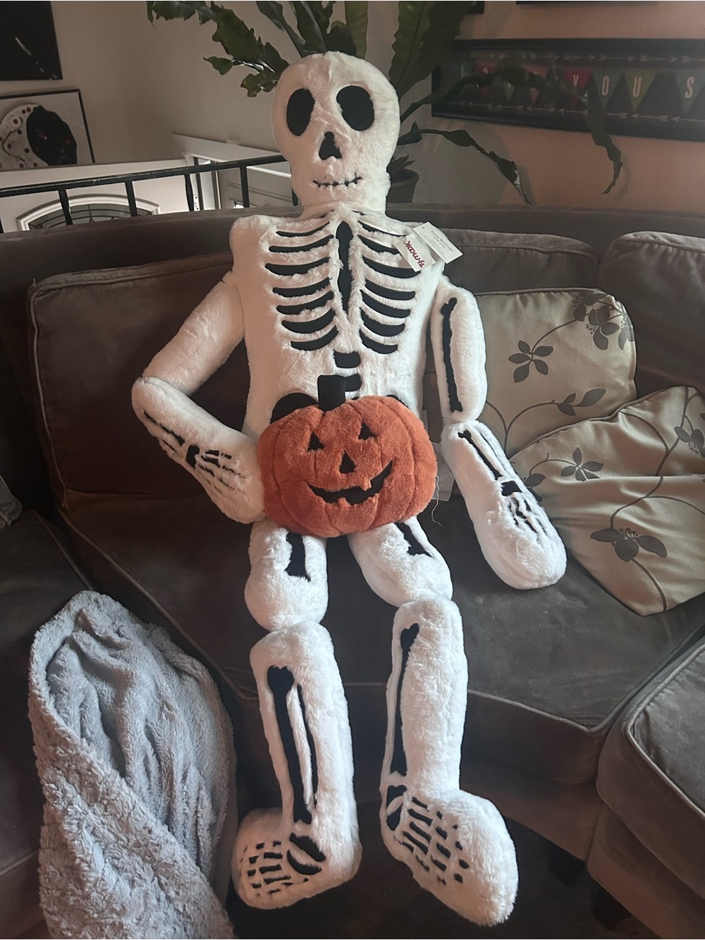 Skeleton with pumpkin life size plush